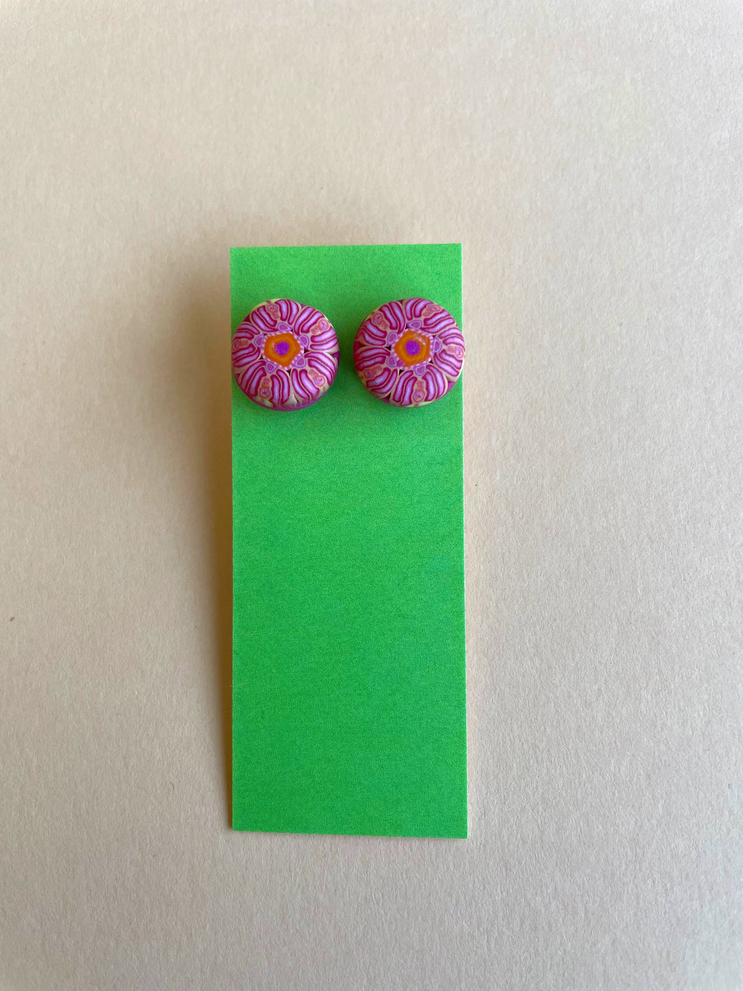 Stud earrings in pink flower design