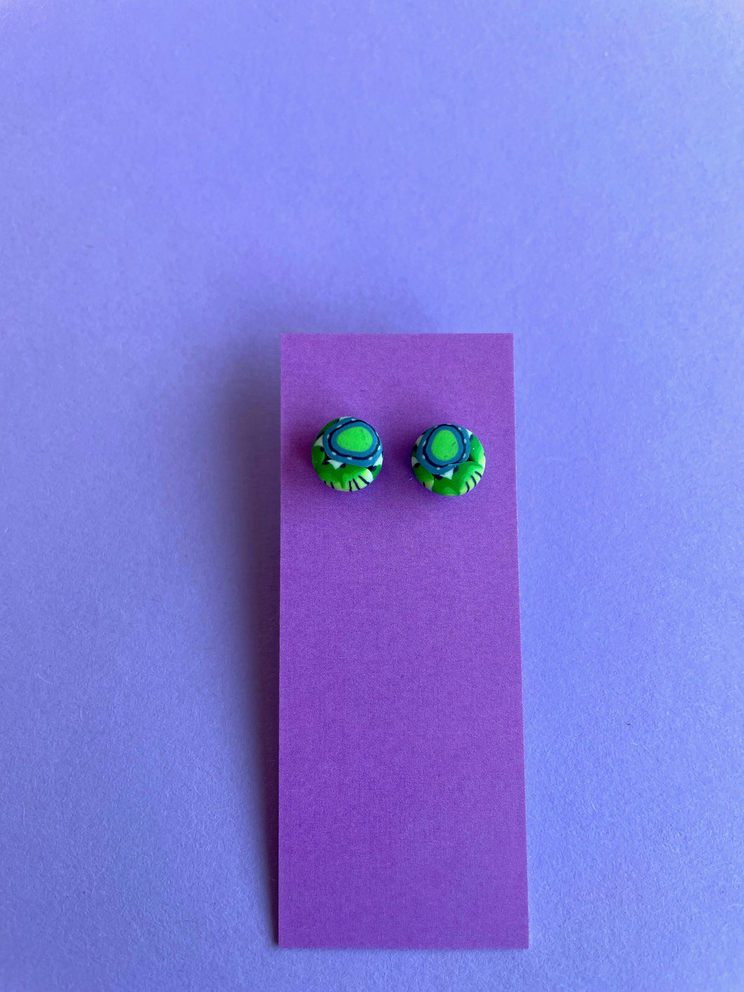 Stud earrings in bright green circle design