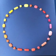 Load image into Gallery viewer, Comfits necklace in red, pink, orange and yellow contemporary necklace