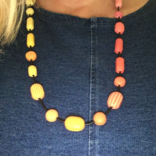 Load image into Gallery viewer, Comfits necklace in red, pink, orange and yellow contemporary necklace