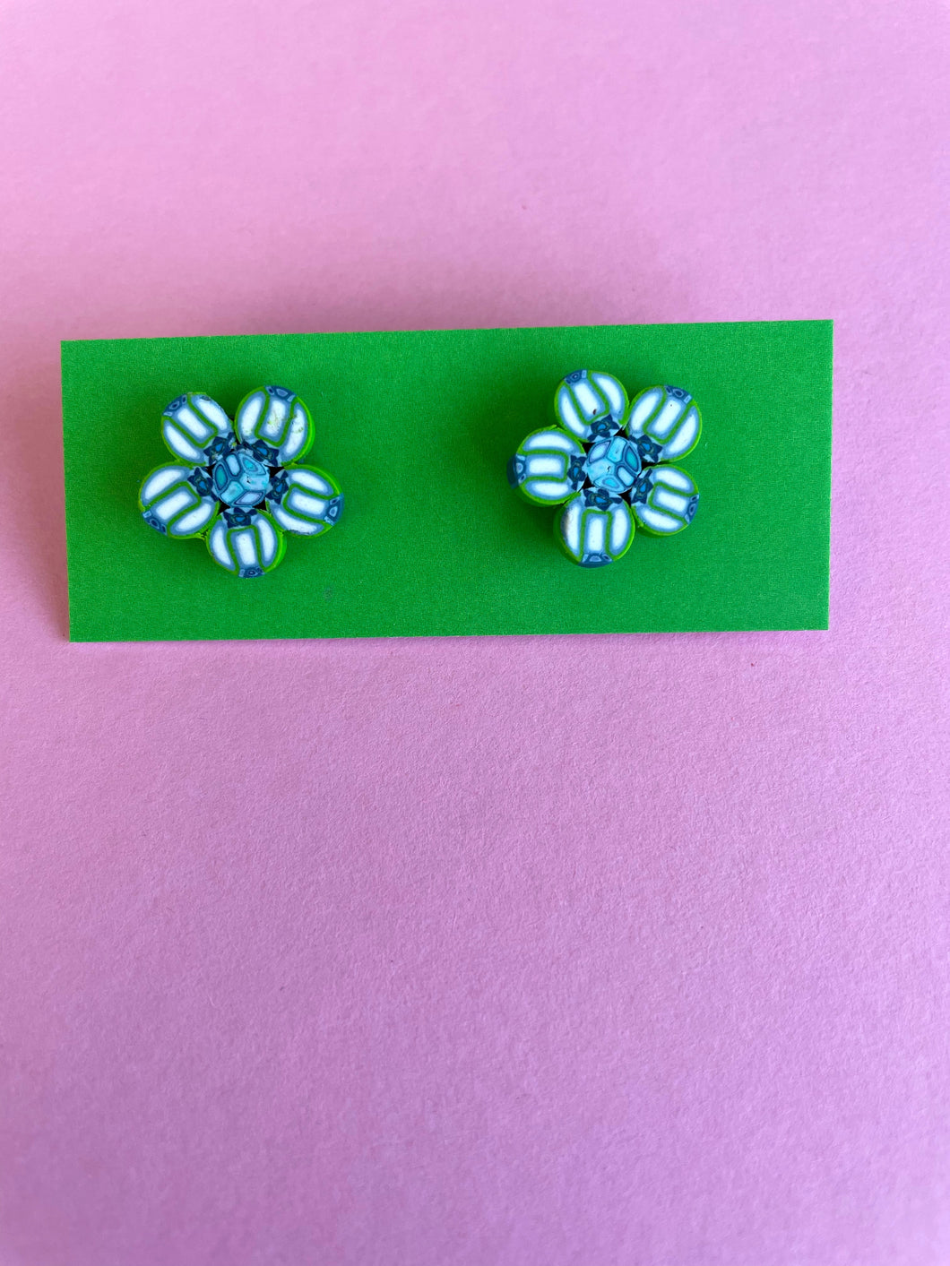 Stud earrings in green and blue flower shape