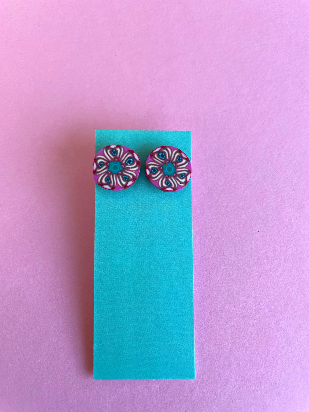 Stud earrings in pink flower design