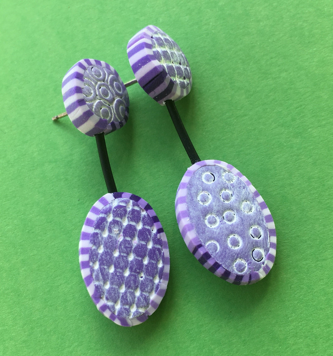 Polymer clay earrings, in Lavender and white.